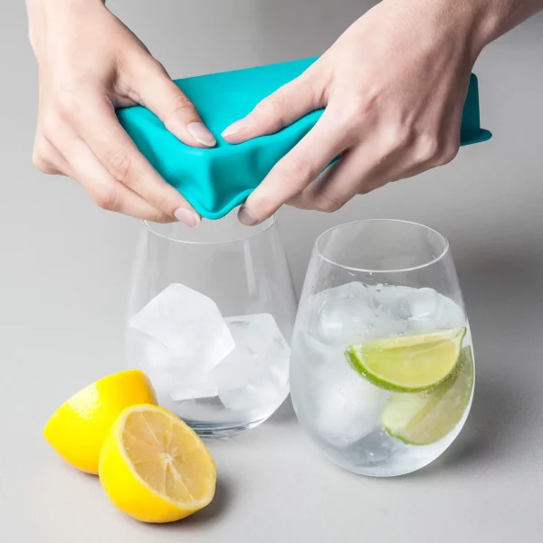 zeal-j274_silicone-ice-cube-tray-in-aqua_in-use_2000x2000