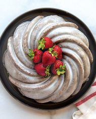 94077_Swirl_Bundt_Glazed_Overhead_Berries_2_E__56283.1657663940.1280.1280